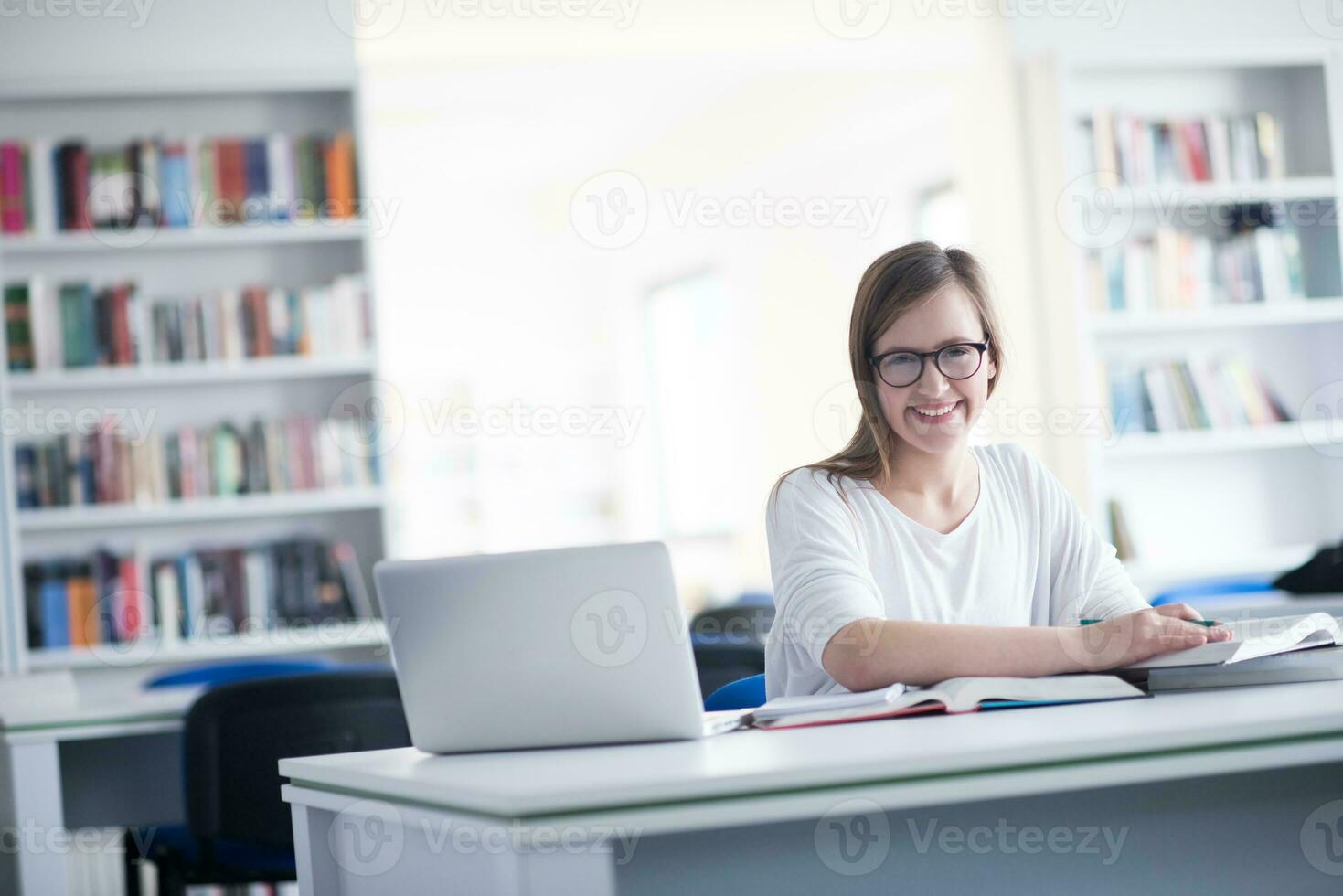 female student study in school library photo