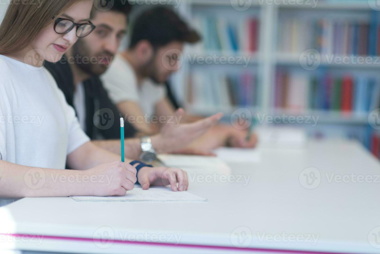 group of students study together in classroom photo