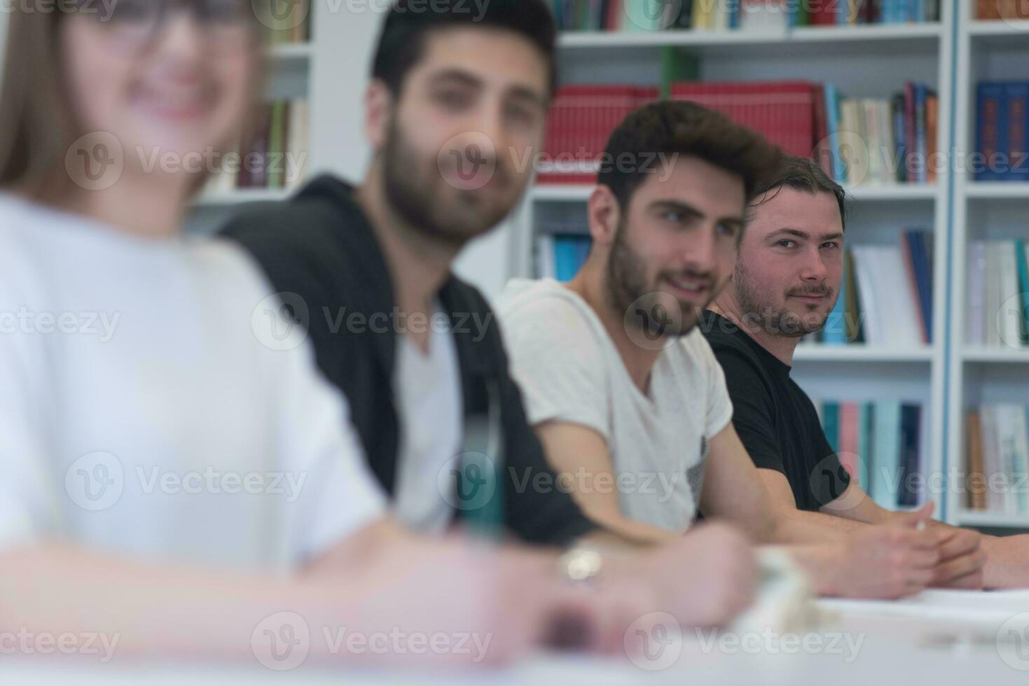 group of students study together in classroom photo