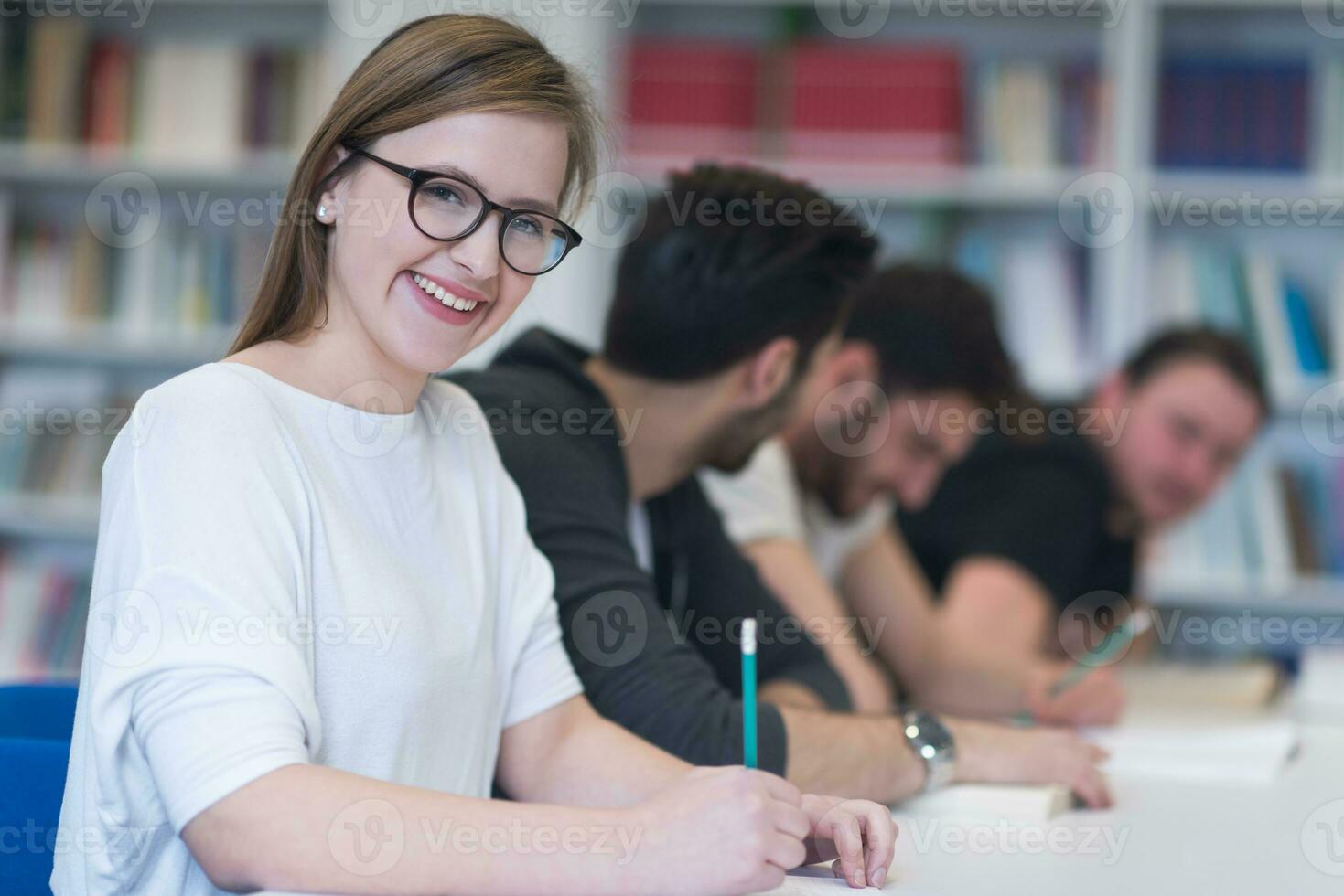 group of students study together in classroom photo