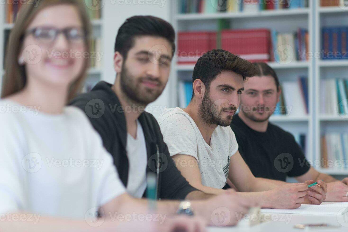 group of students study together in classroom photo