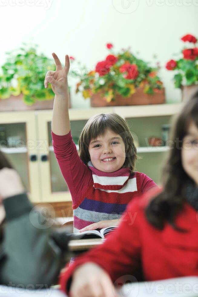 happy child  in schoold have fun and learning leassos photo