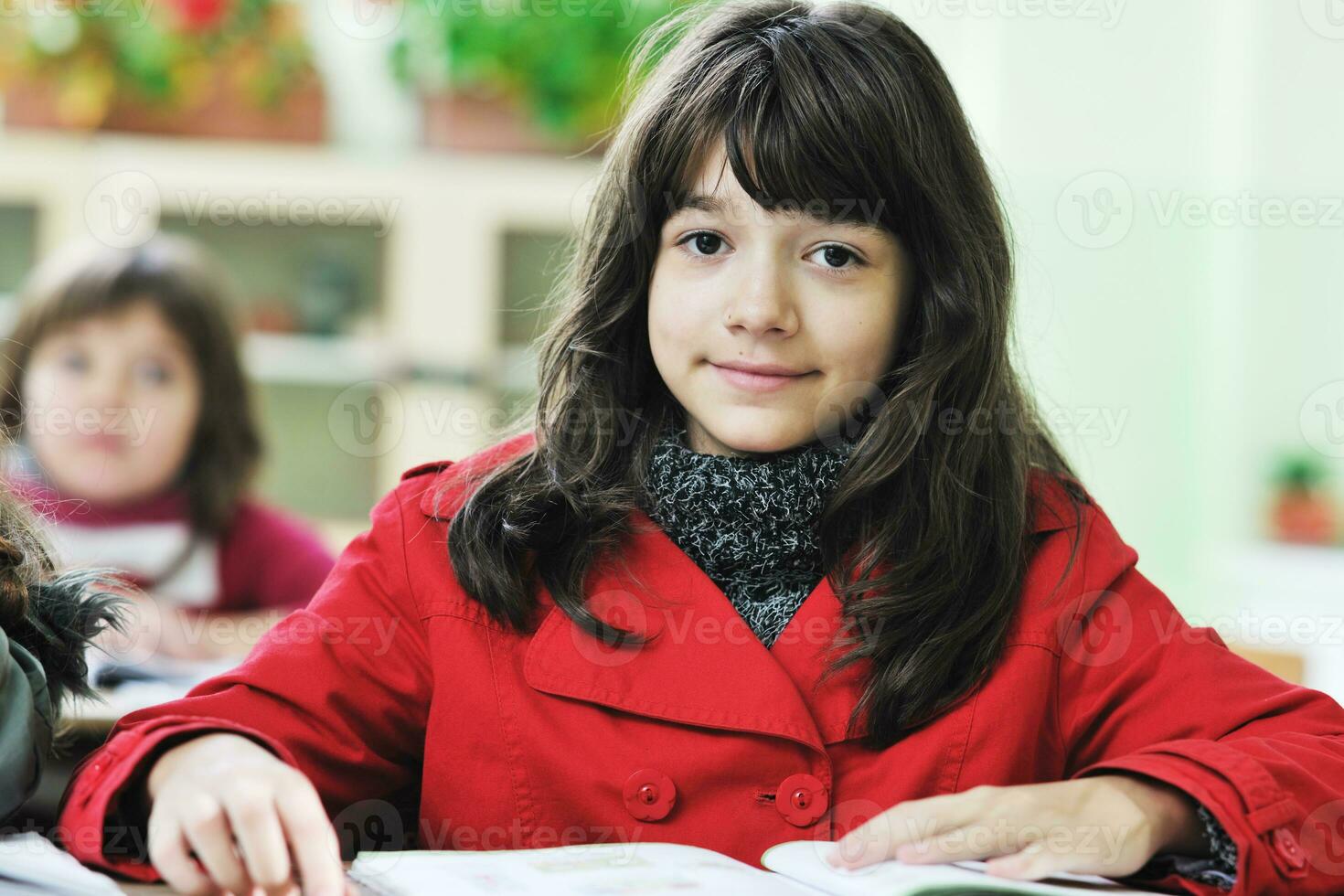 happy child  in schoold have fun and learning leassos photo