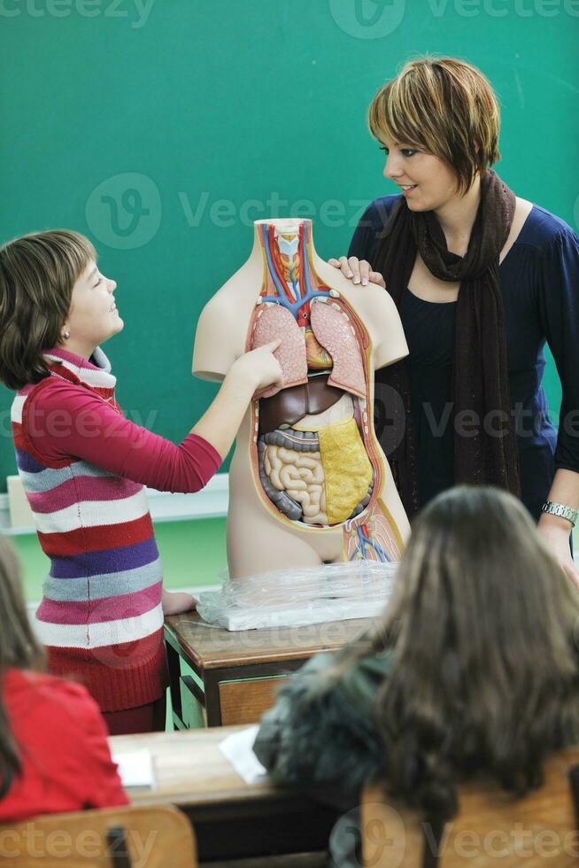 happy school girl on math classes photo