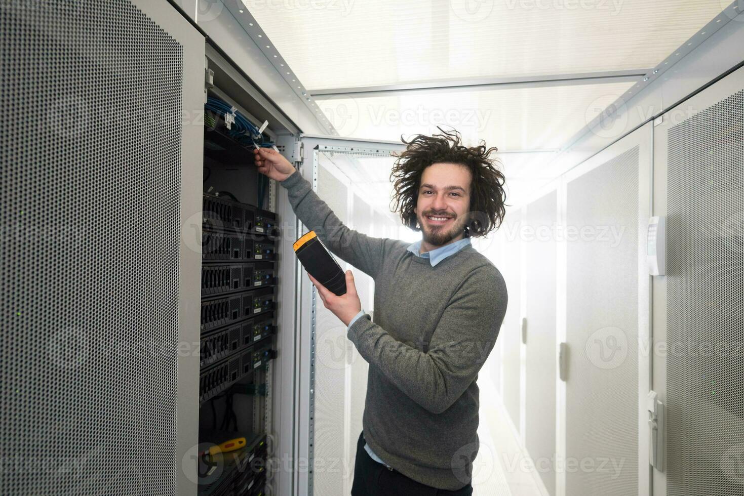 technician using digital cable analyzer photo