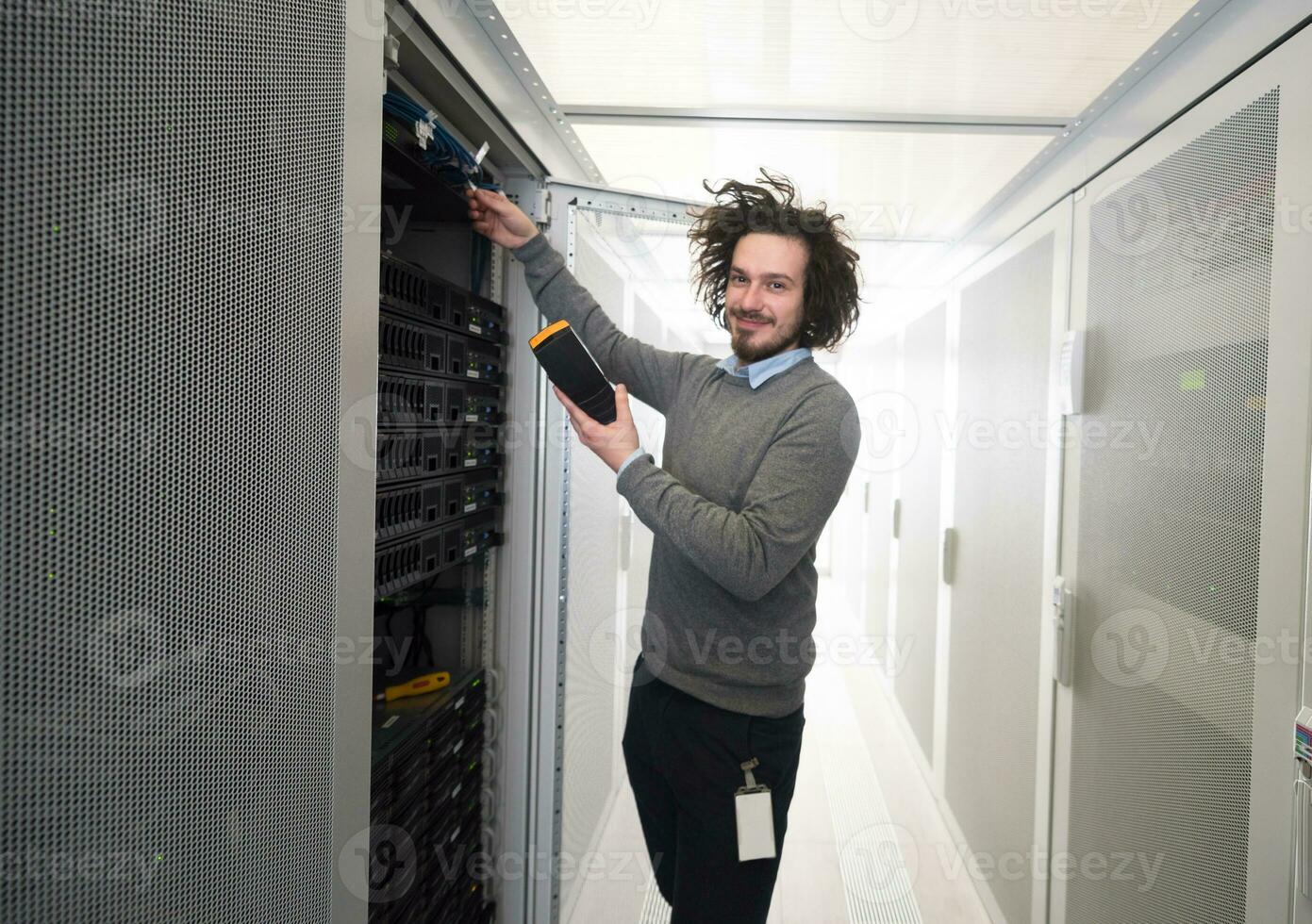 technician using digital cable analyzer photo