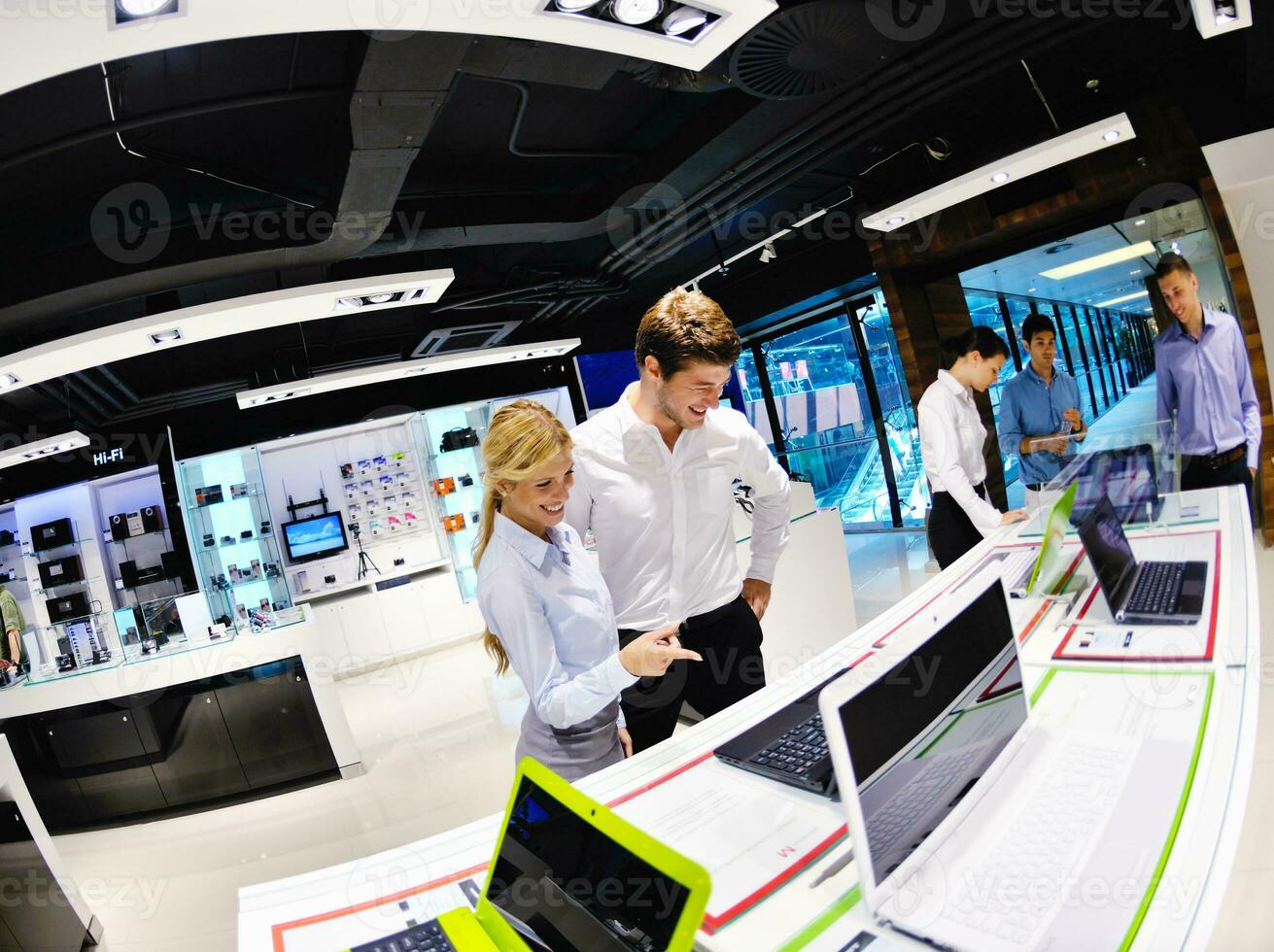 Young couple in consumer electronics store photo