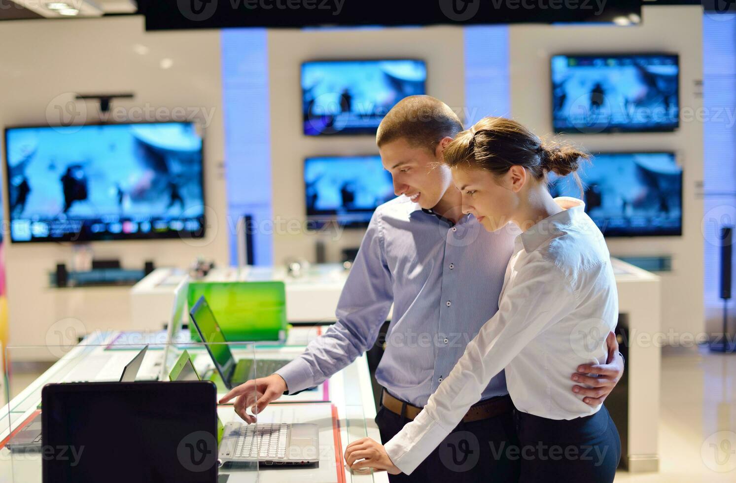 people buy  in consumer electronics store photo