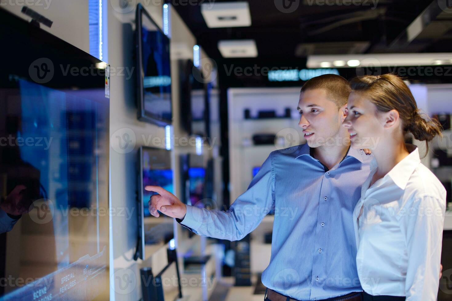 people buy  in consumer electronics store photo