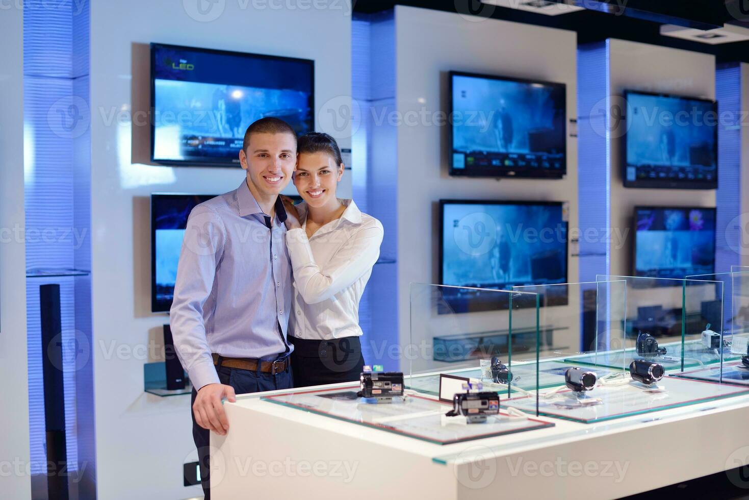 people buy  in consumer electronics store photo