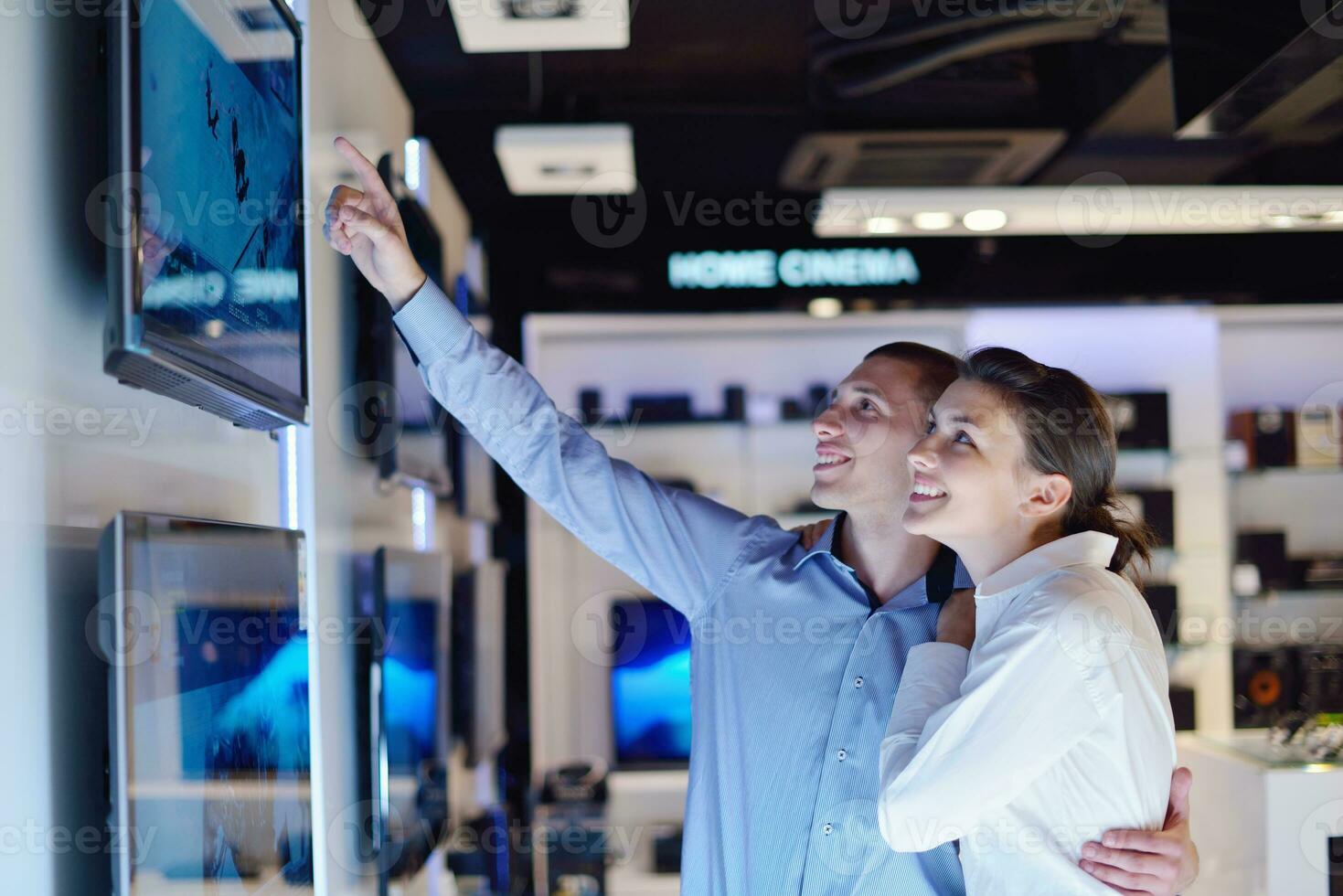 people buy  in consumer electronics store photo