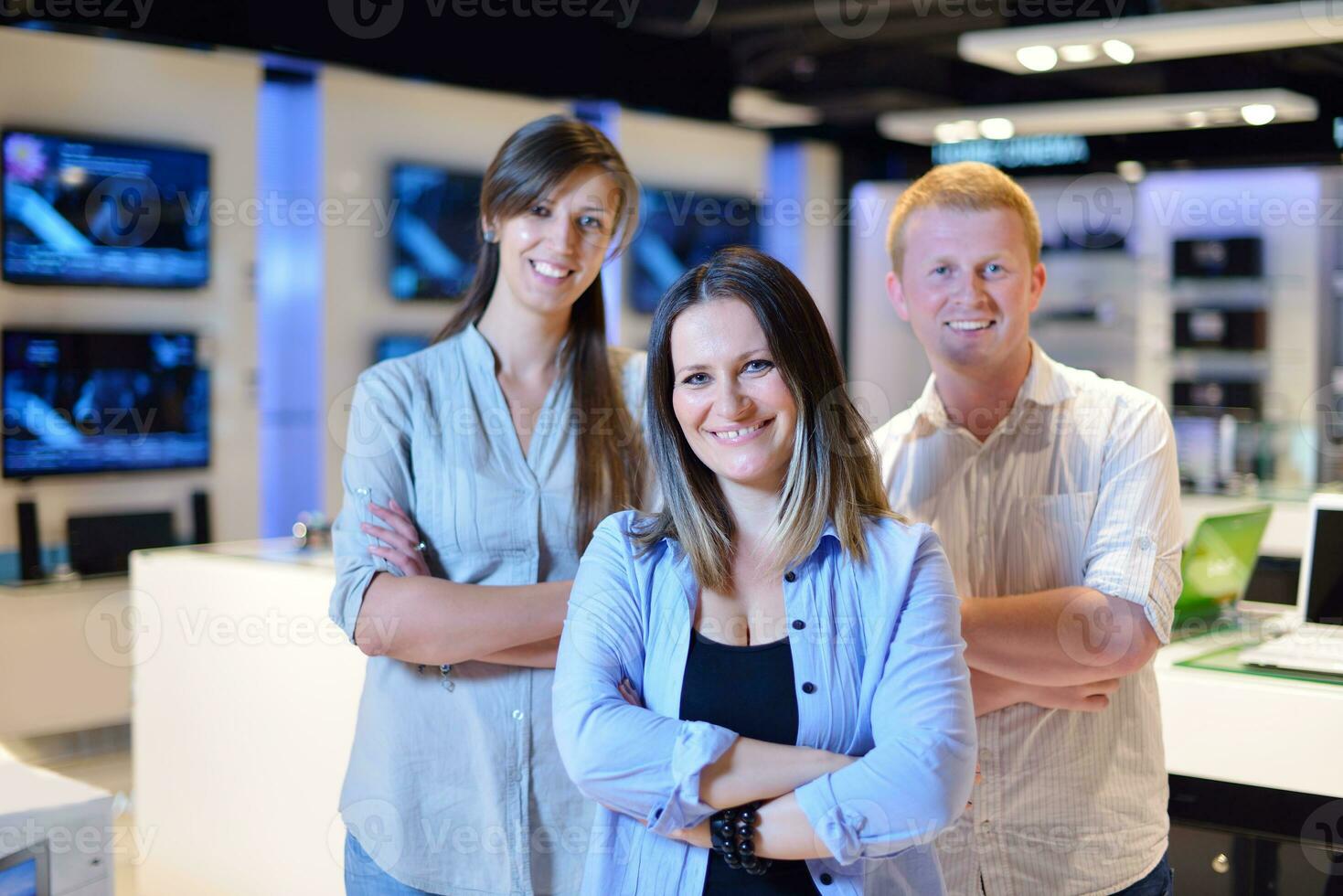 people buy  in consumer electronics store photo