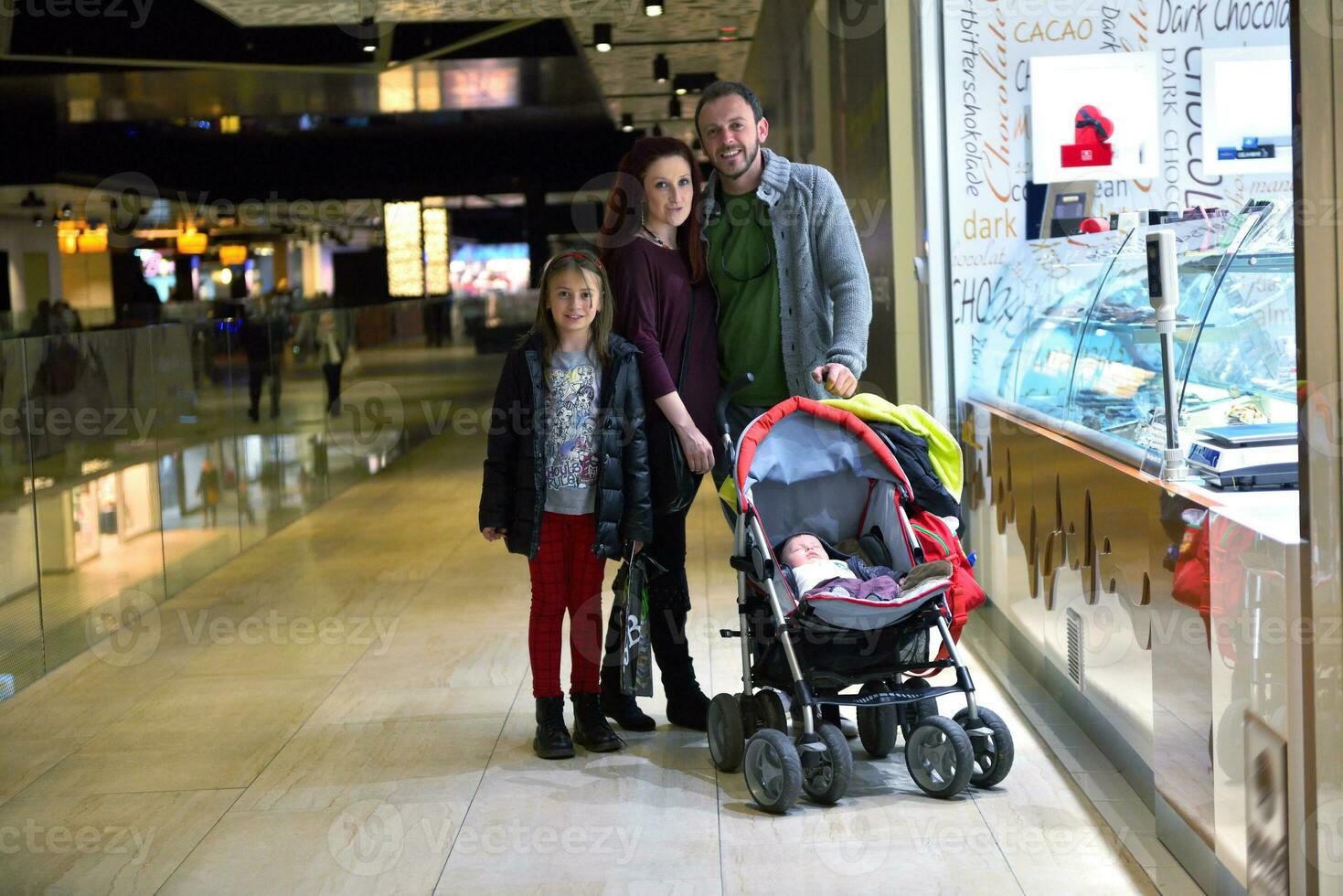 family in shopping mall photo