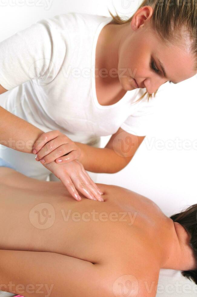 back massage at the spa and wellness center photo