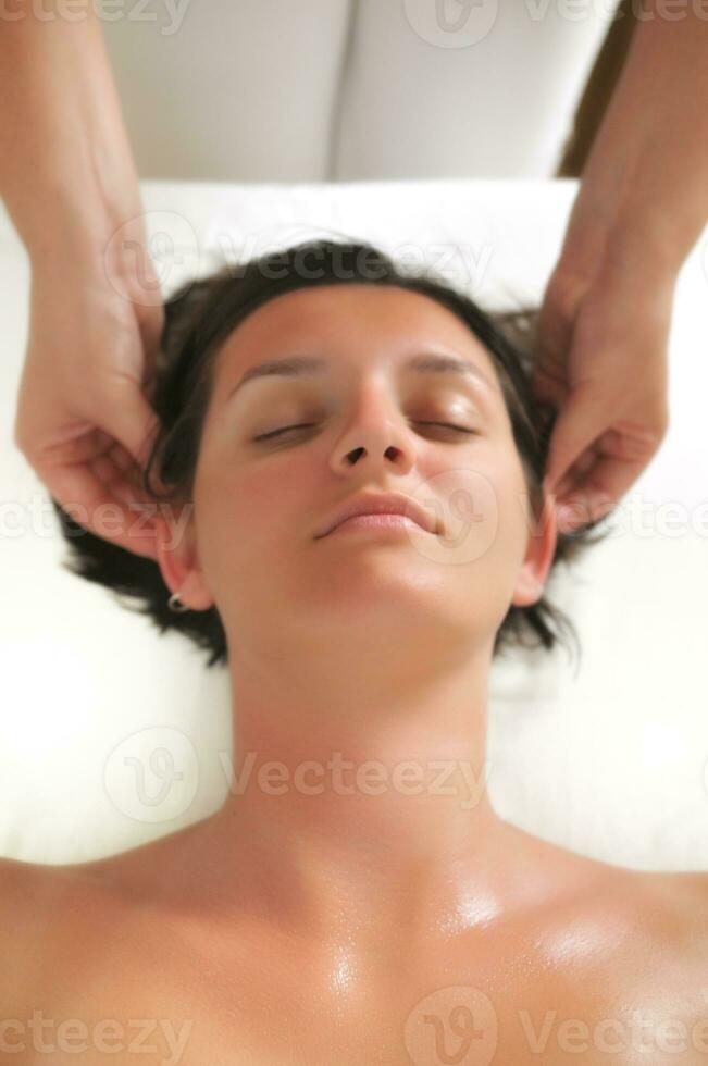 beautiful woman have massage at spa and wellness center photo