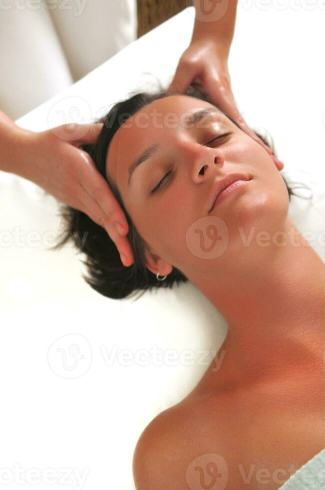 beautiful woman have massage at spa and wellness center photo