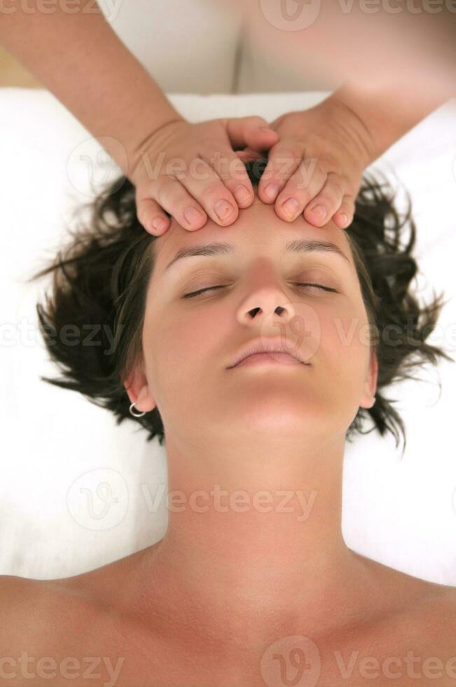 beautiful woman have massage at spa and wellness center photo