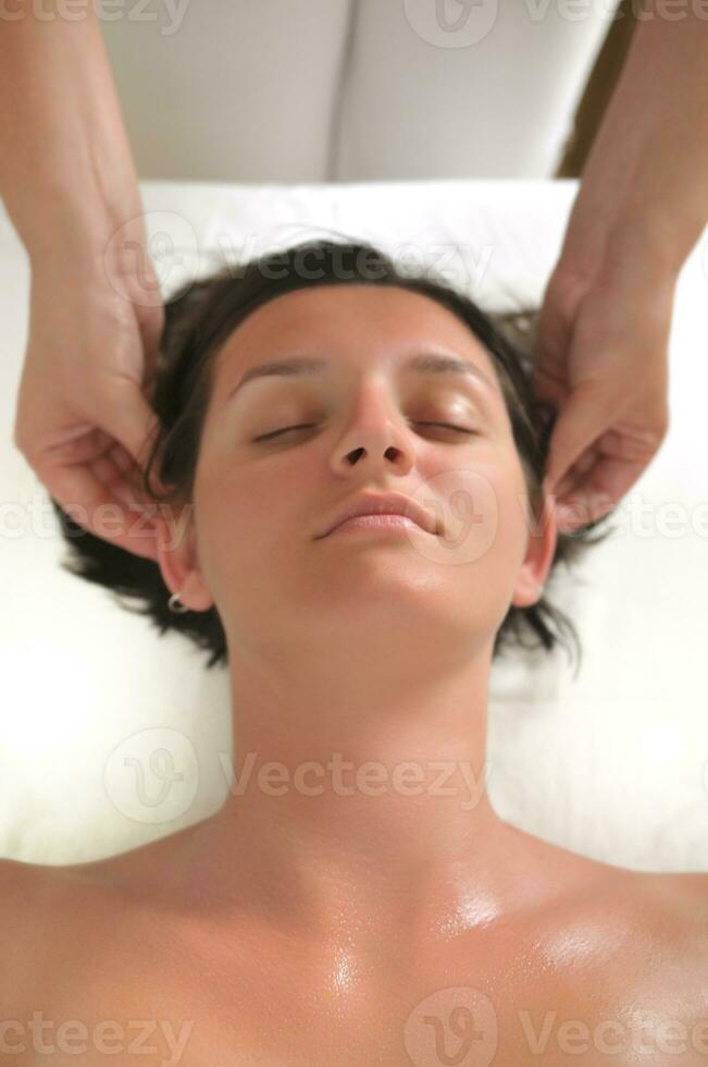 beautiful woman have massage at spa and wellness center photo