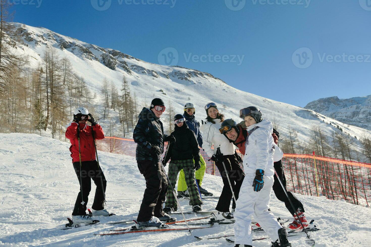 winter portrait of friends at skiing photo