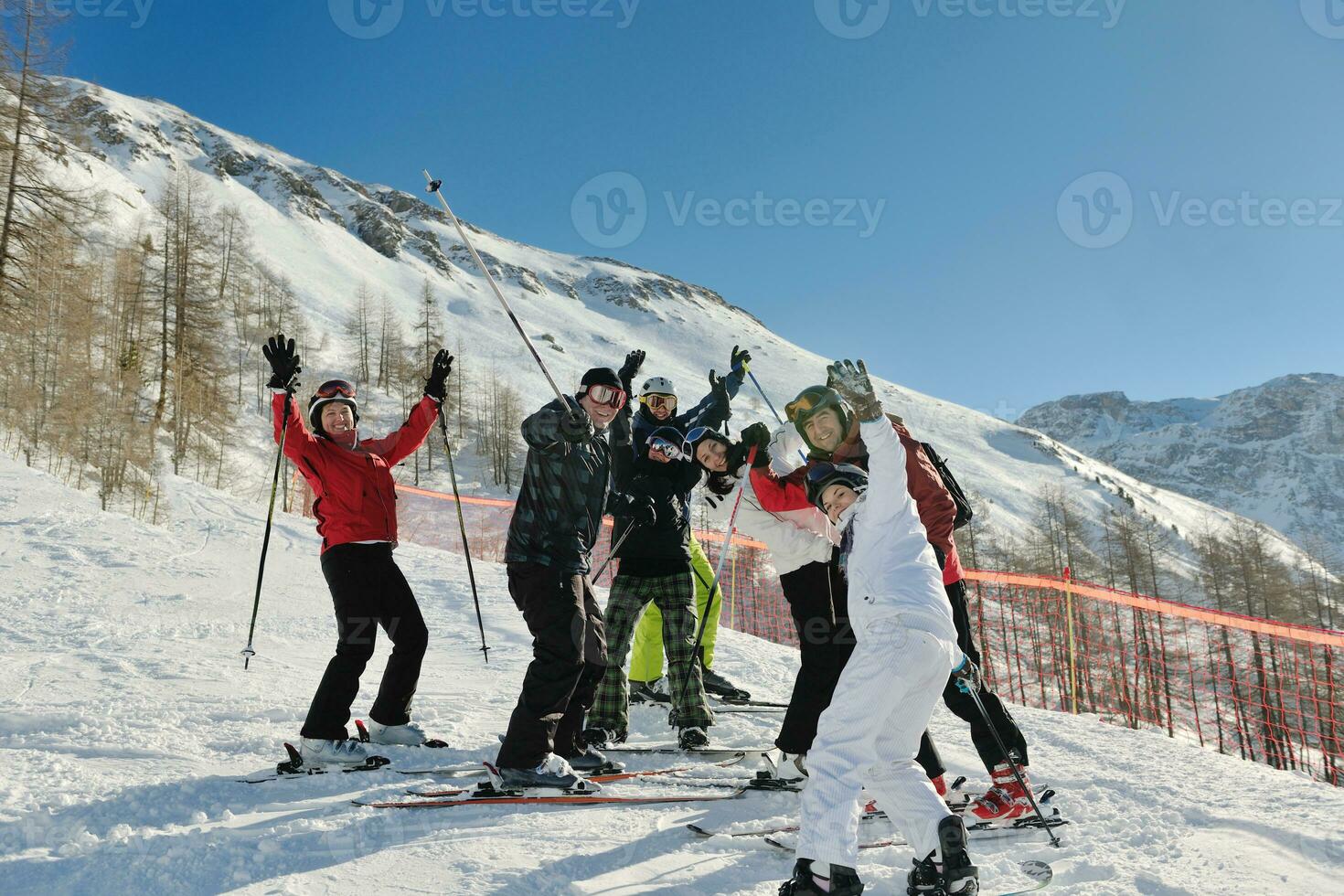 winter portrait of friends at skiing photo