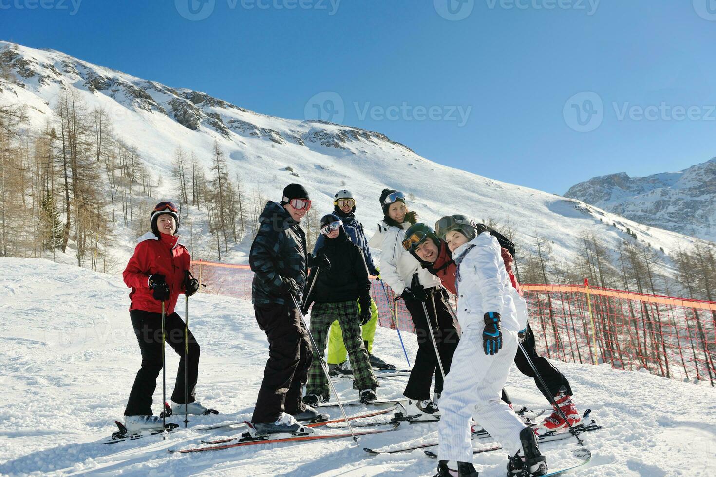 winter portrait of friends at skiing photo