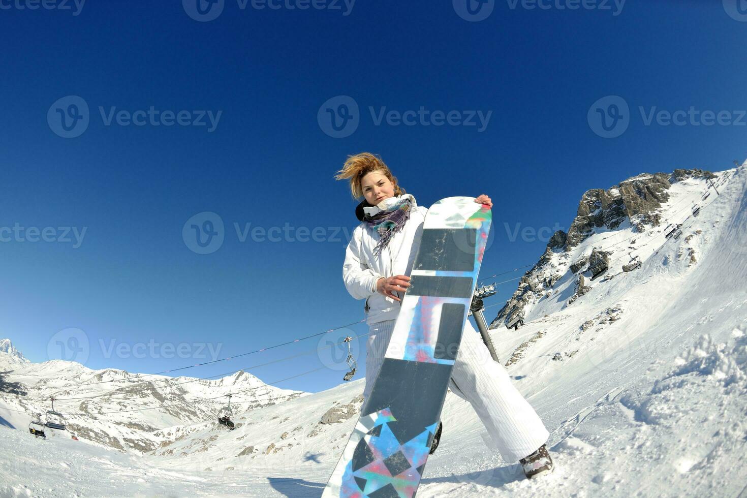 skiing on fresh snow at winter season at beautiful sunny day photo