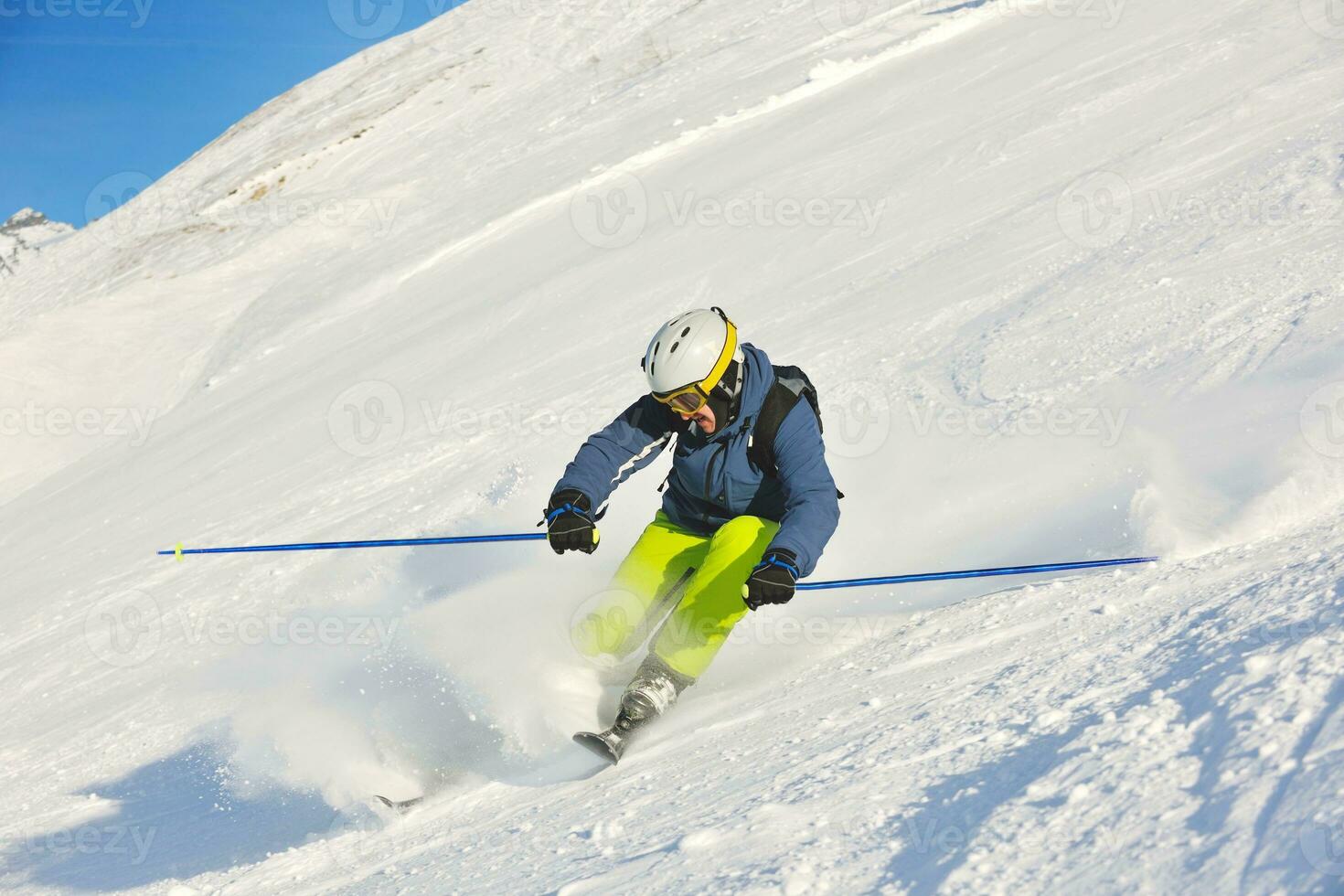 AI generated young man skiing on high snow mountain in winter