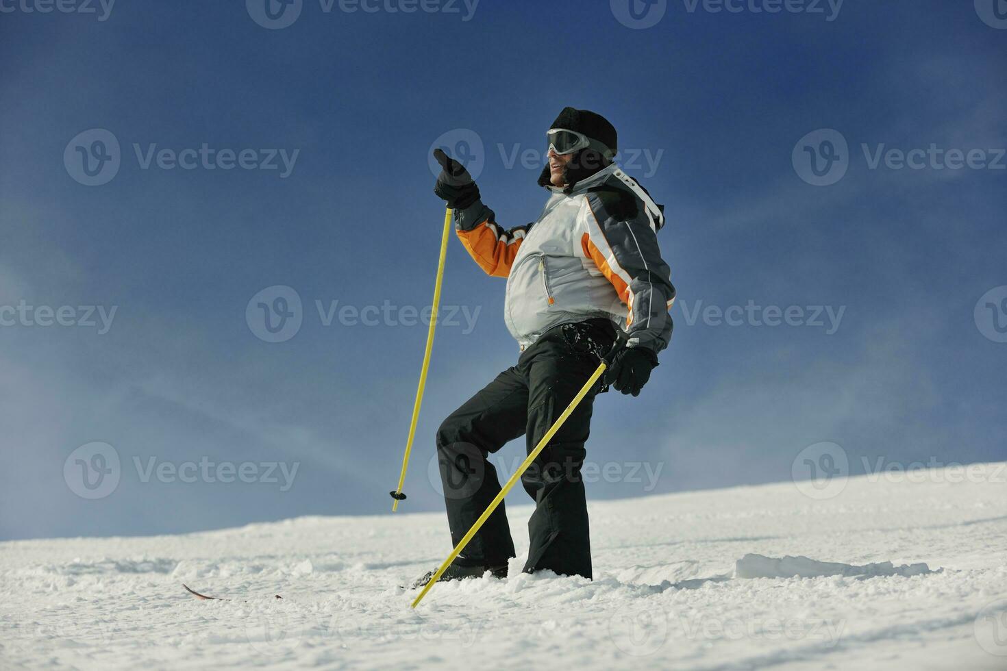 skier pointing direction photo