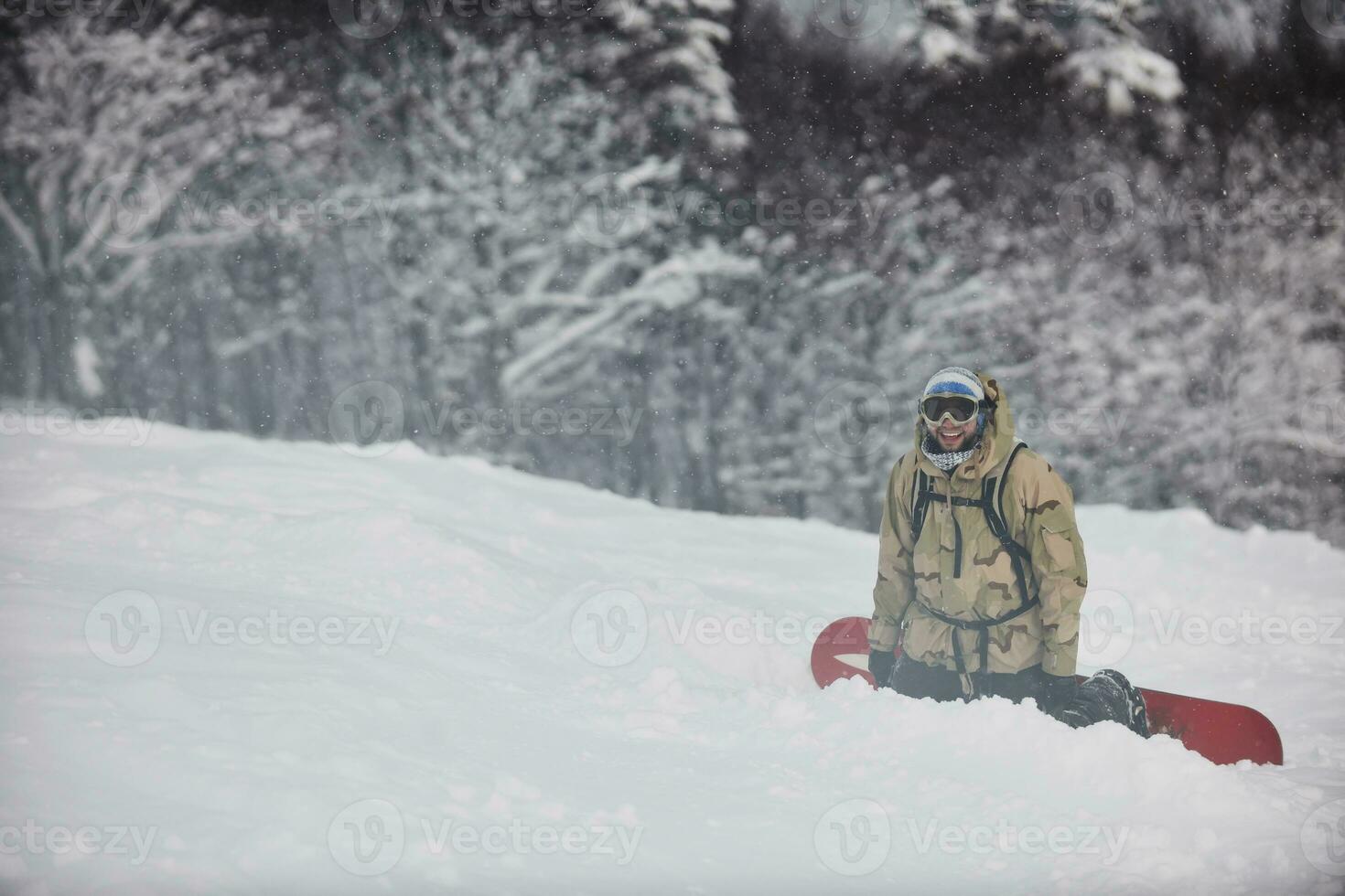 happy snowboarder portrait photo