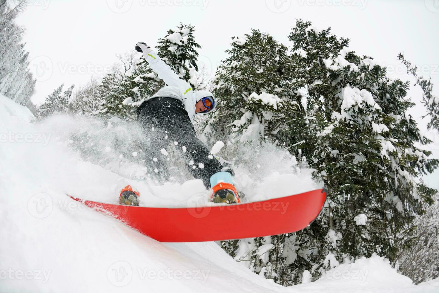 snowboarder on fresh deep snow photo