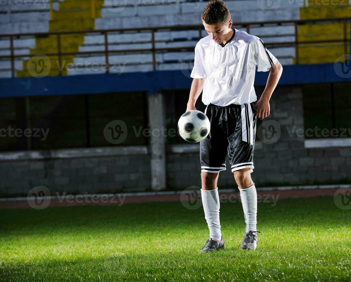 jugador de fútbol en acción foto