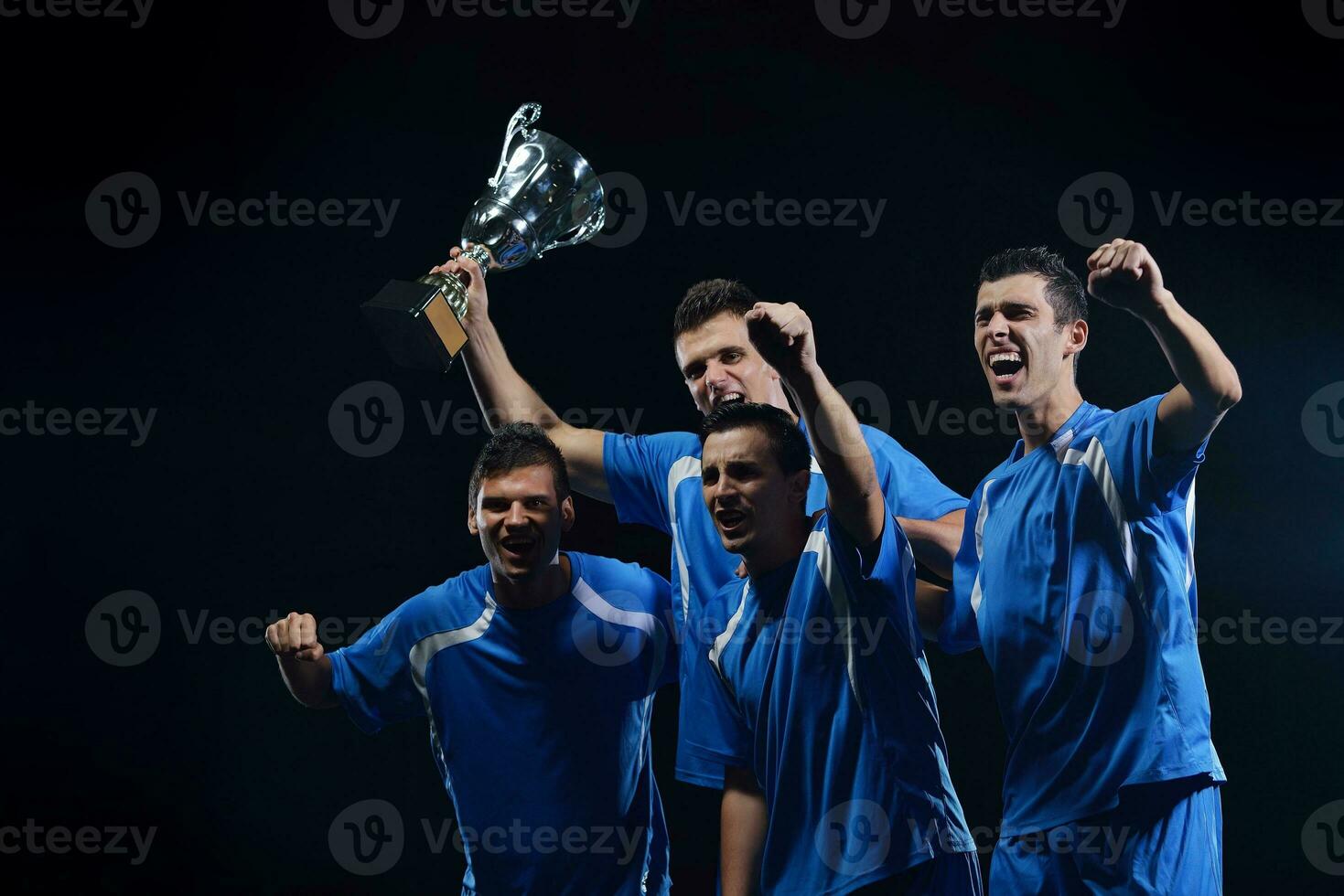 soccer players celebrating victory photo