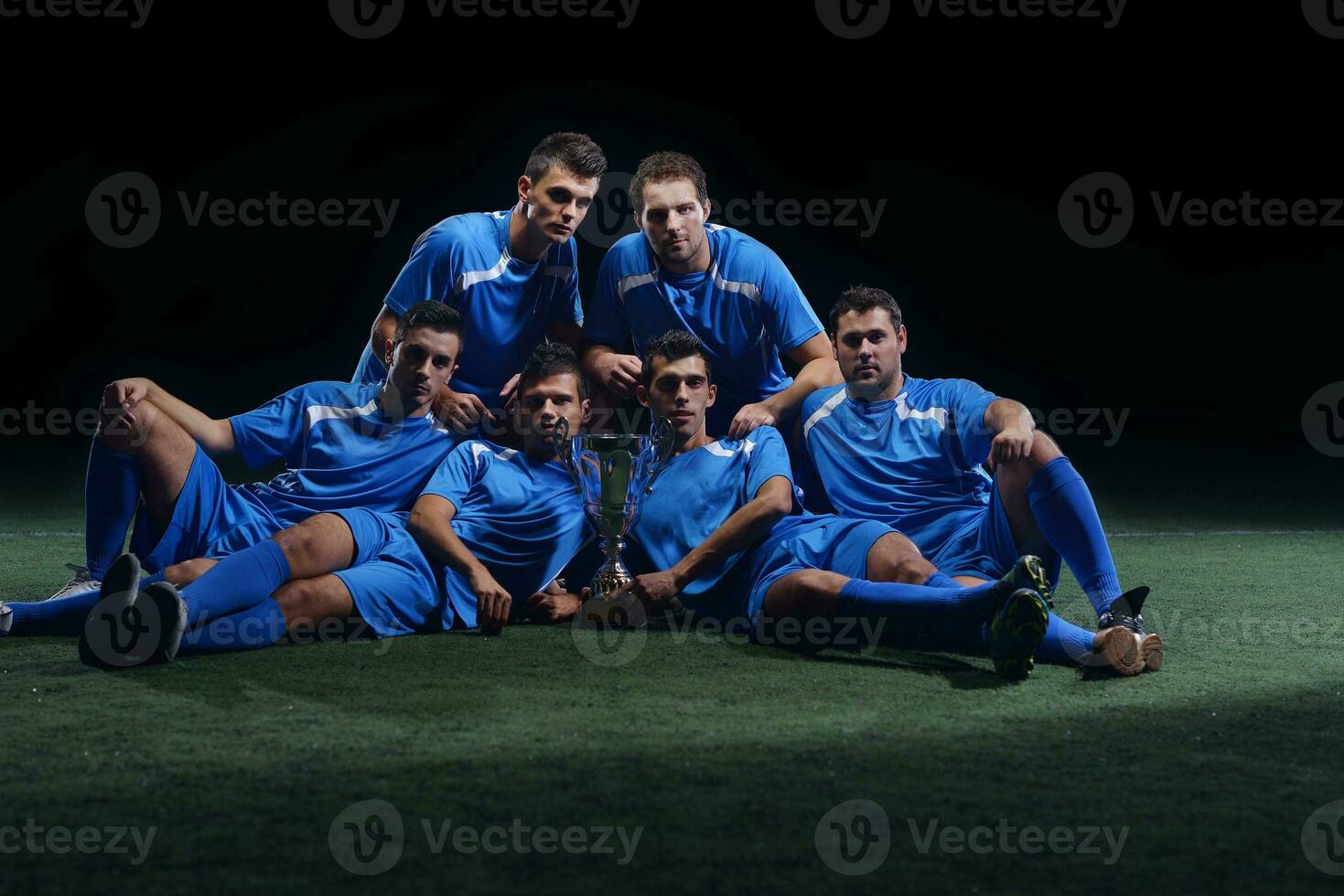 soccer players celebrating victory photo