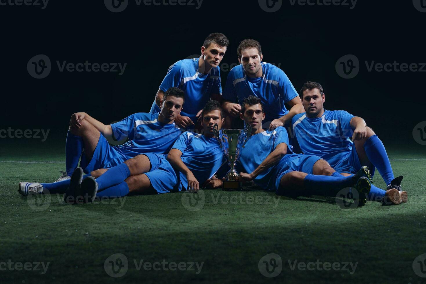 soccer players celebrating victory photo