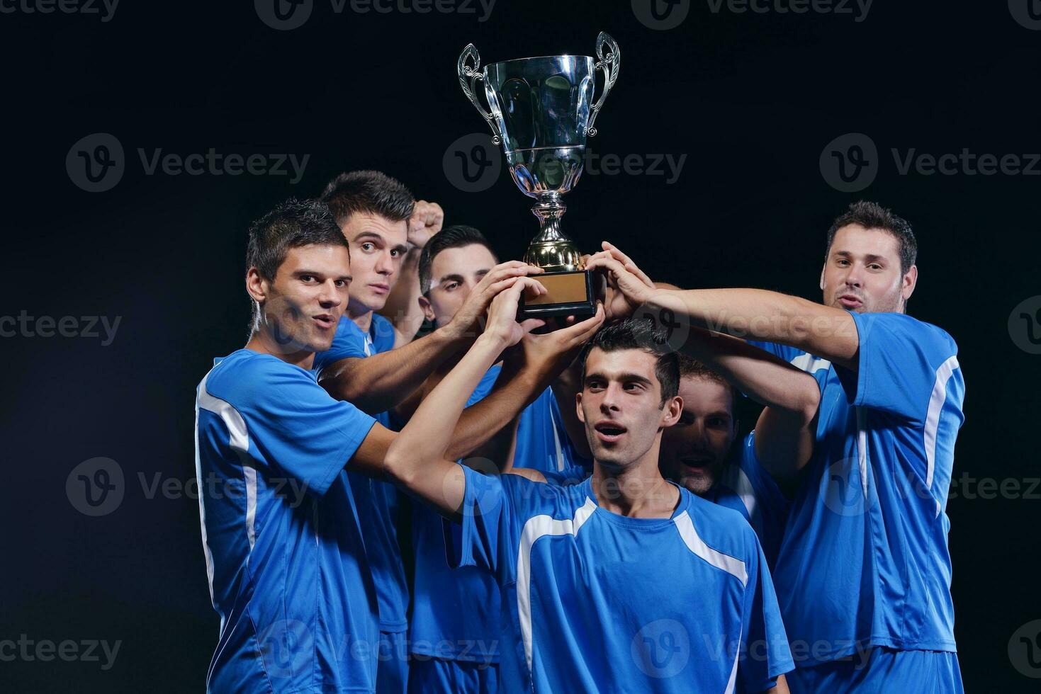 soccer players celebrating victory photo