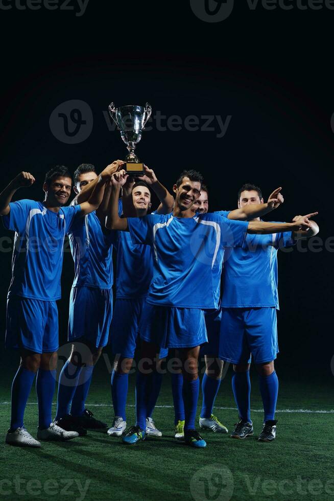 soccer players celebrating victory photo