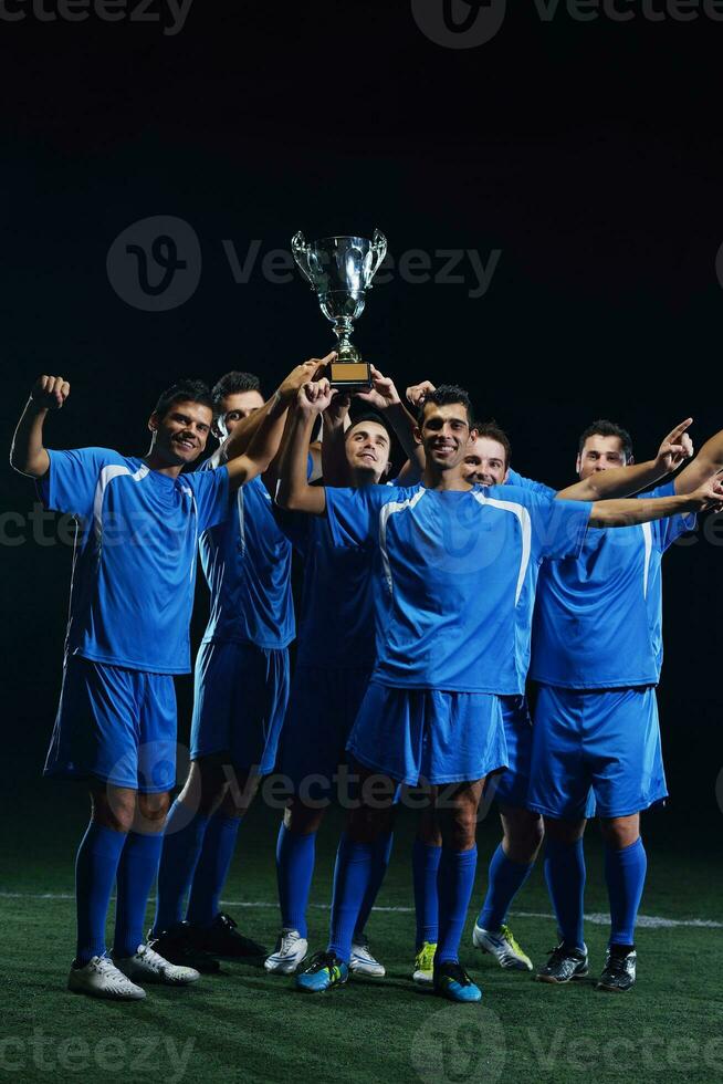soccer players celebrating victory photo