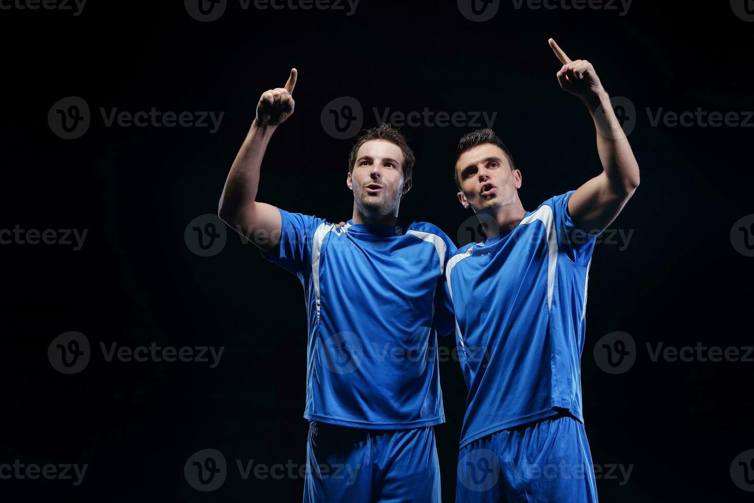 soccer players celebrating victory photo