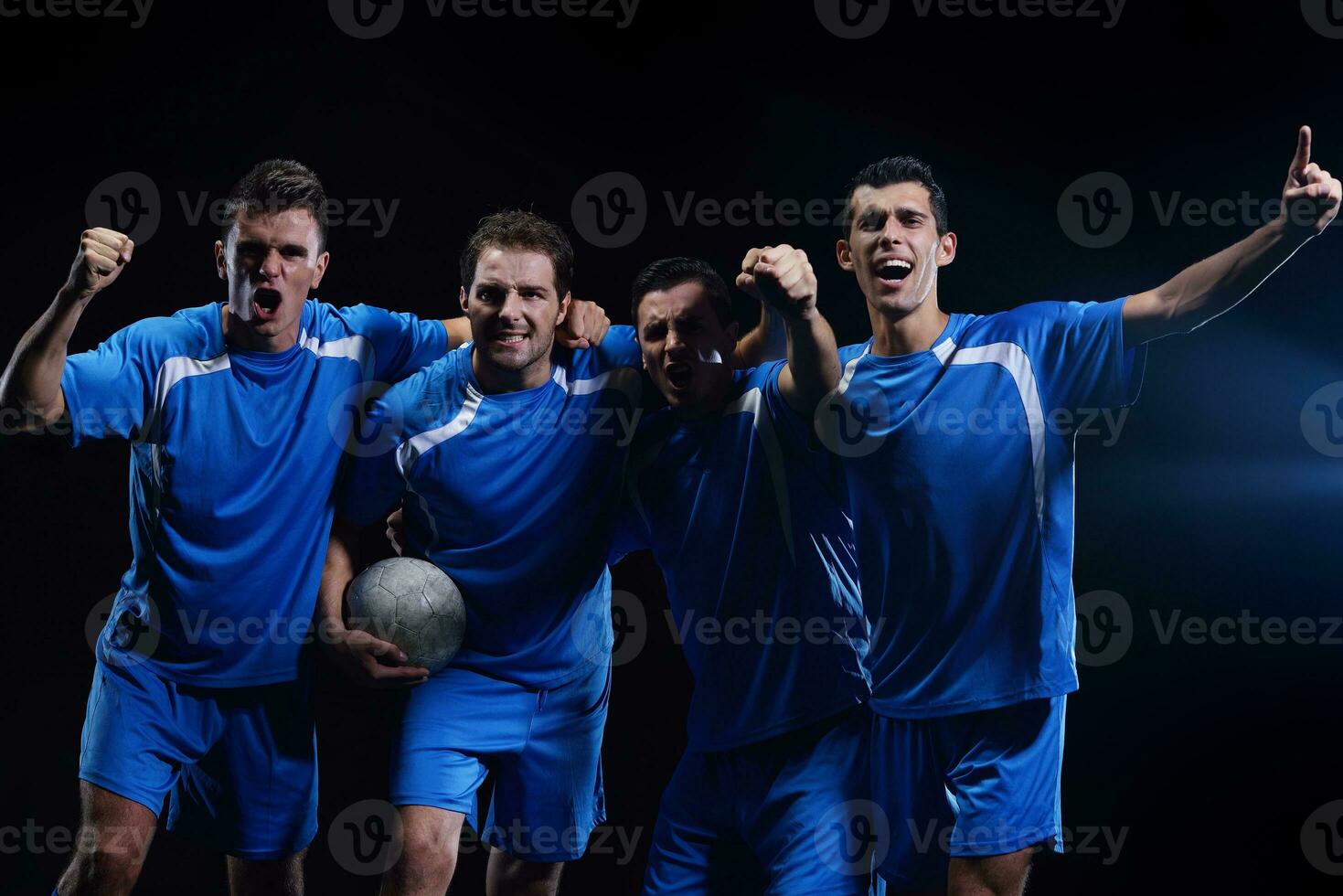 soccer players celebrating victory photo