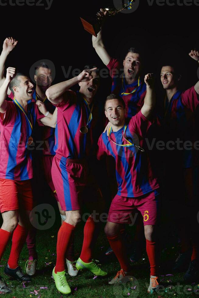 soccer players celebrating victory photo