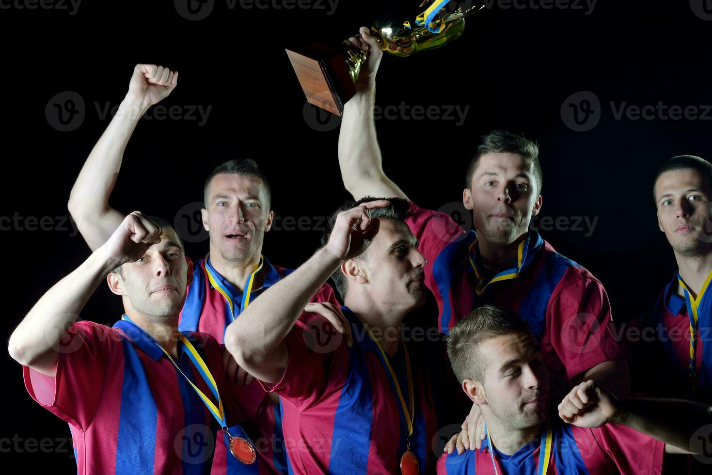 soccer players celebrating victory photo