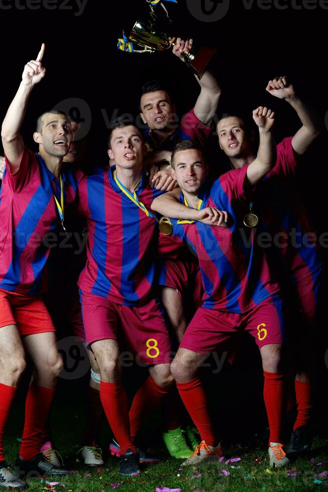 soccer players celebrating victory photo