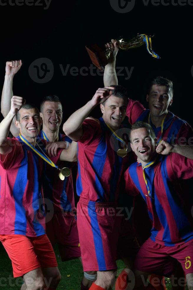 soccer players celebrating victory photo