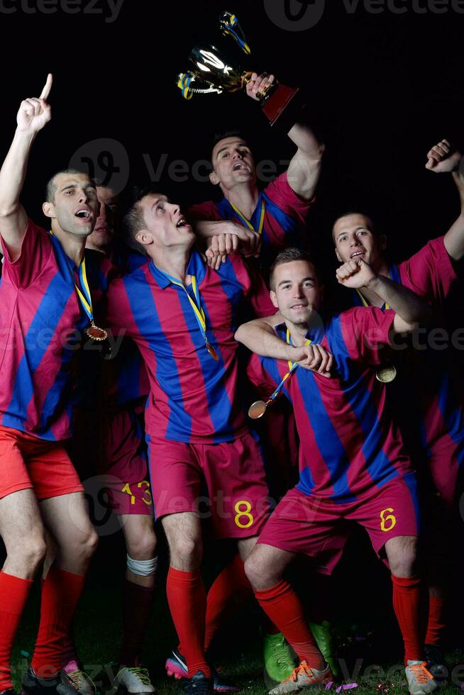 soccer players celebrating victory photo