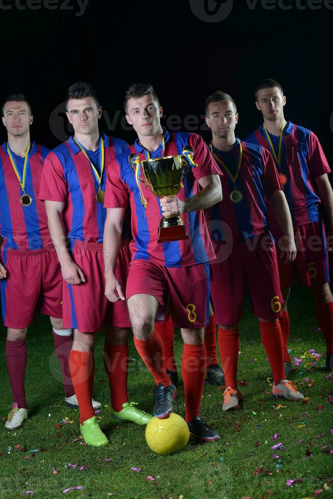 soccer players celebrating victory photo