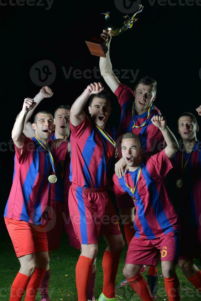 soccer players celebrating victory photo