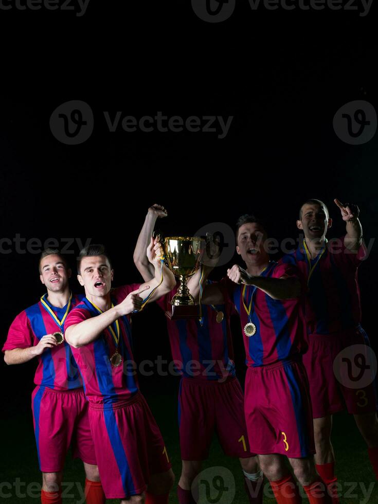 jugadores de fútbol celebrando la victoria foto