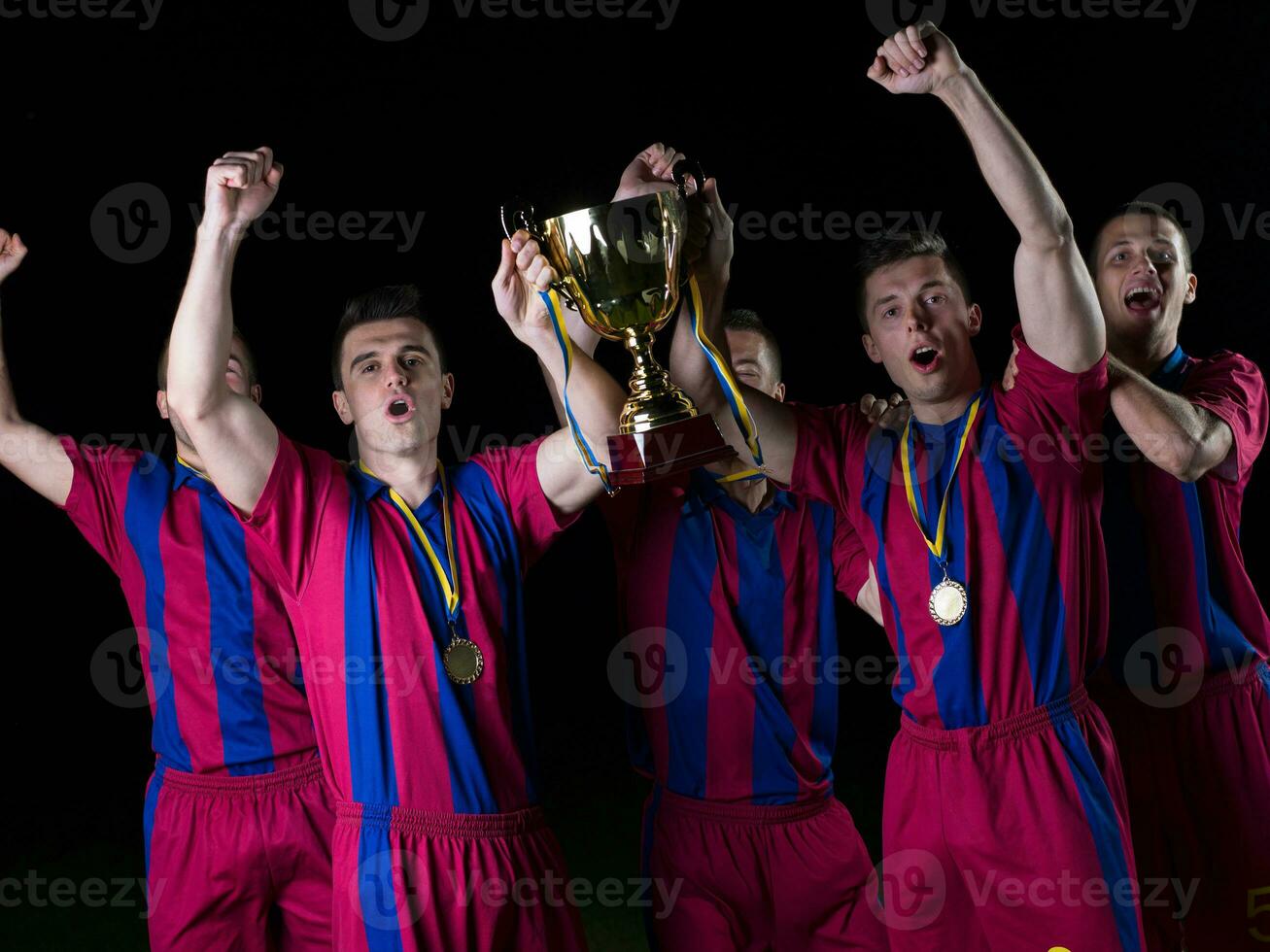 soccer players celebrating victory photo