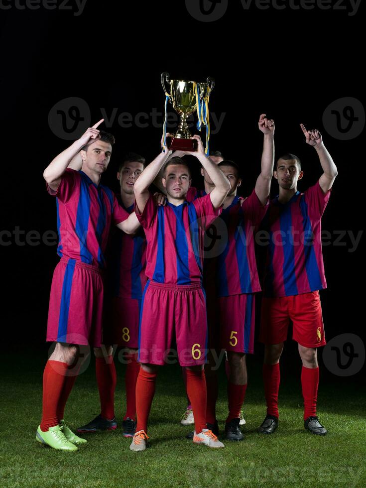 jugadores de fútbol celebrando la victoria foto