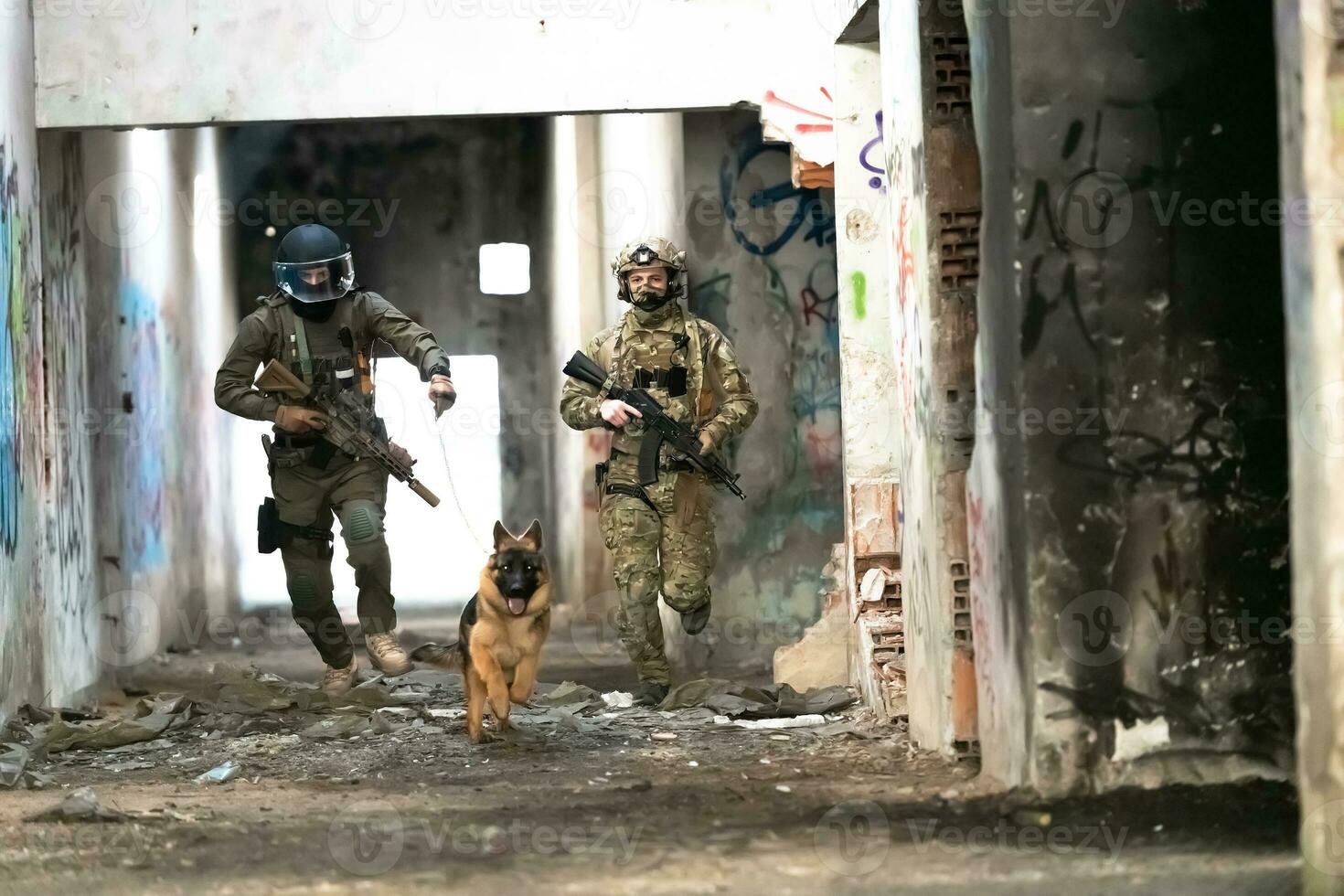 Modern Warfare Soldiers with military working dog in action on the battlefield. photo